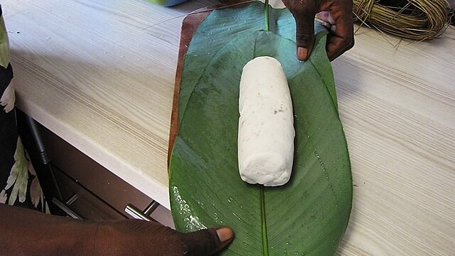 Cassava_flour_-_roll_of_dough_on_leaf_wrap